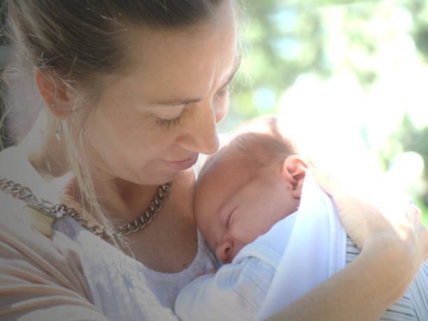 istock mother with baby portrait 1048544704