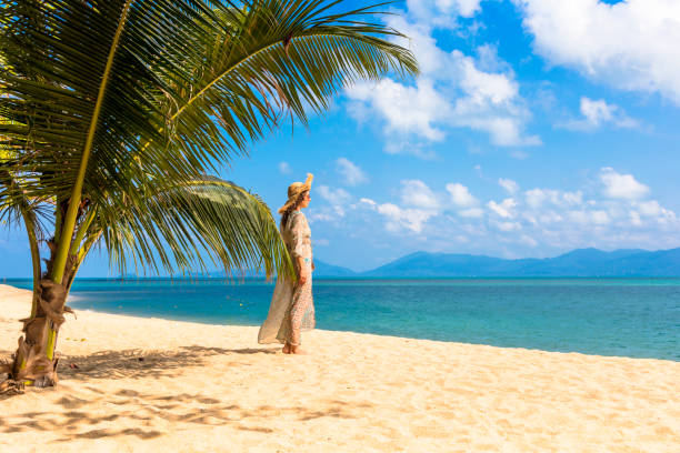 istock Woman at tropical 1048545010