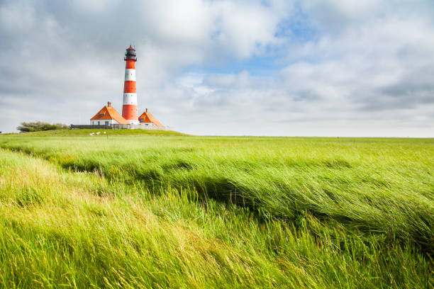 istock Westerheversand lighthouse, North Sea, Schleswig-Holstein, Germany 1048549014