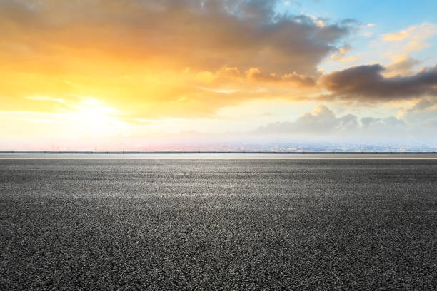 istock Panoramic city skyline and buildings with empty asphalt road 1048551246