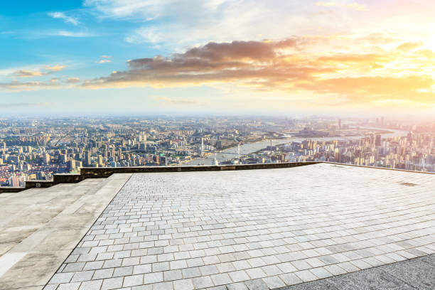 istock Panoramic skyline and buildings with empty city square floor 1048561834