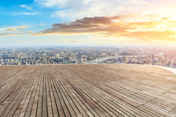 istock Panoramic skyline and buildings with wooden square floor 1048562564