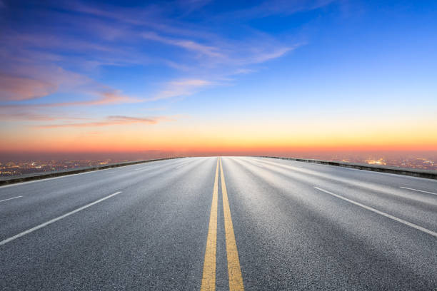 istock Modern city skyline and buildings with empty asphalt road 1048564962