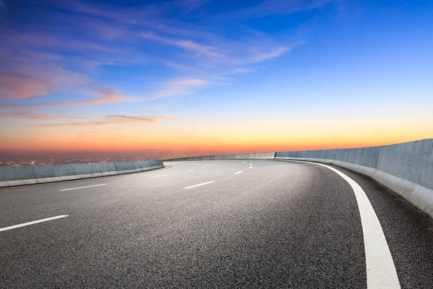 istock Modern city skyline and buildings with empty asphalt road 1048565034