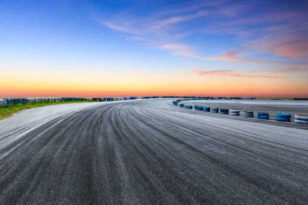 istock Car racing track and beautiful sky clouds 1048582234