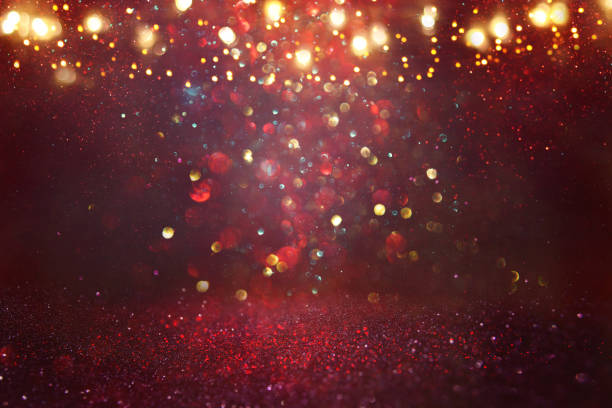 istock Red, black and gold glitter lights background. defocused. 1048619386