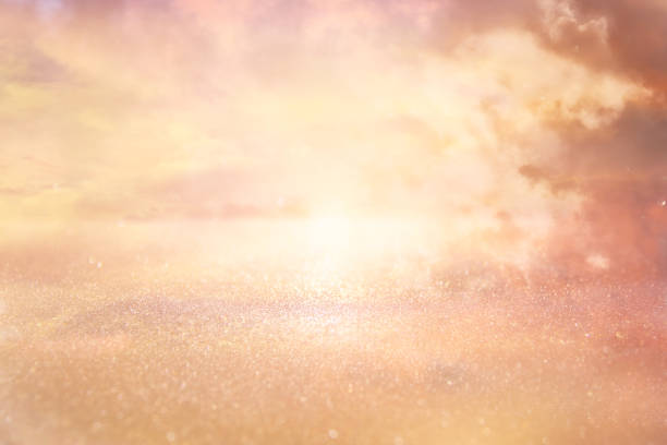 istock glitter vintage lights background. silver, gold and white. de-focused. 1048619398