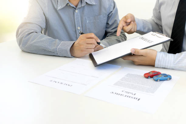 istock Young Business man insurance agent show document contract 1048627582