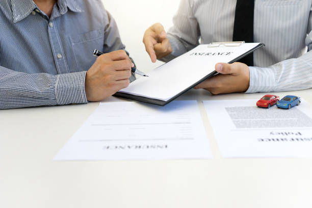 istock Young Business man insurance agent show document contract 1048627586