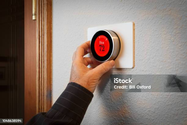 Smart Home Digital Thermostat Heating And Cooling Automation System Stock Photo - Download Image Now