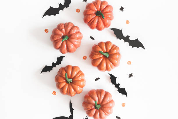 istock Halloween decorations on white background. Halloween concept. Flat lay, top view 1048643842