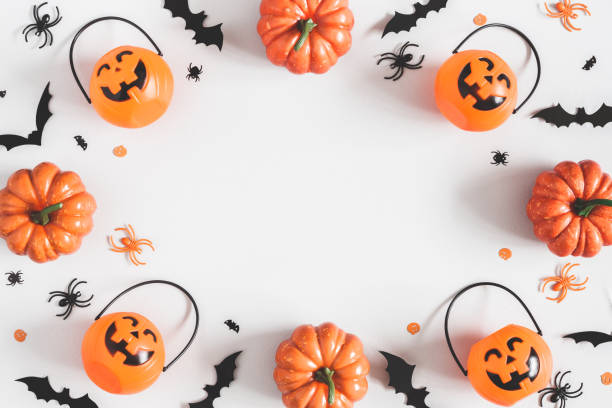 istock Halloween decorations on pastel gray background. Halloween concept. Flat lay, top view, copy space 1048643850