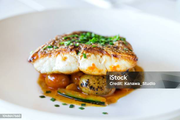Grilled Fish Fillet With Vegetables Stock Photo - Download Image Now - Fish, Hake, Plate