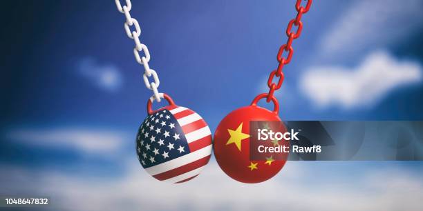 Usa And Chinese Flags Wrecking Balls Swinging On Blue Cloudy Sky Background 3d Illustration Stock Photo - Download Image Now