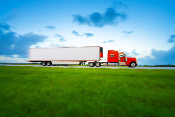 istock Truck on the highway panning motion 1048647960