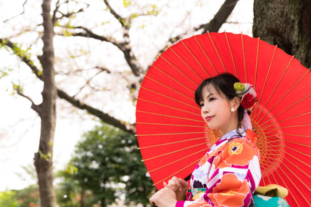 istock Young asian girl wearing kimono (Japanese traditional clothes). 1048650440