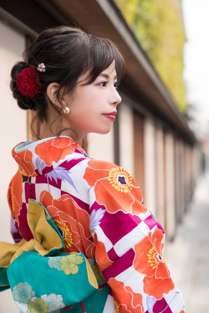 istock Young asian girl wearing kimono (Japanese traditional clothes). 1048650520