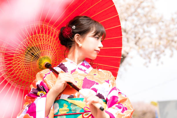 istock Young asian girl wearing kimono (Japanese traditional clothes). 1048650540