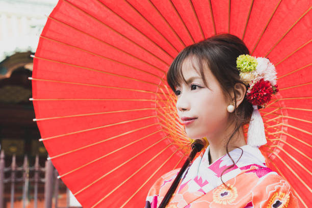 istock Young asian girl wearing kimono (Japanese traditional clothes). 1048650548