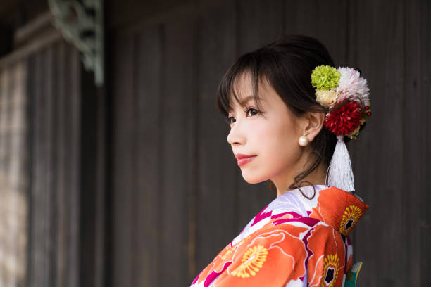 istock Young asian girl wearing kimono (Japanese traditional clothes). 1048650566