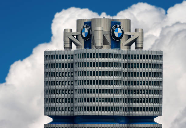 Panoramic view over the Munich city rooftops at sunset. Here you can see BMW headquarters in Munich.