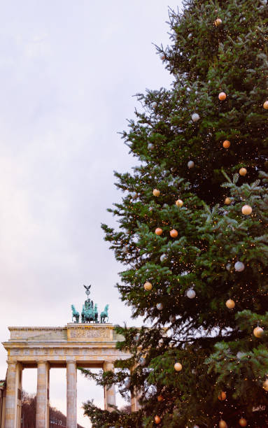 istock Brandenburg Gate Building and Christmas Tree in Berlin 1048654366