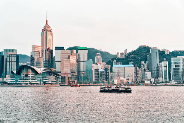 istock Star ferry in Victoria Harbor in HK at sundown 1048660652