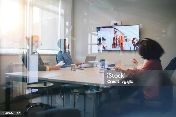 Business Meeting Stock Photo - Download Image Now - Video Conference, Meeting, Meeting Room
