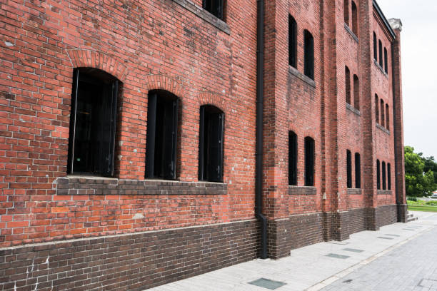 istock Old building style decorated by red block wall as contemporary design 1048664226