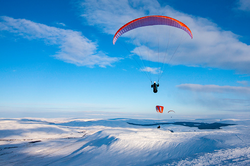 Paragliders on Inglebourgh in the winter, Yorkshire dales