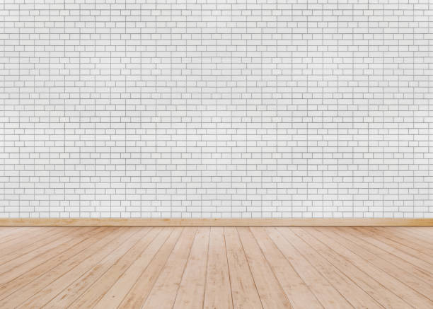 istock white brick wall with Wooden floor 1048680968