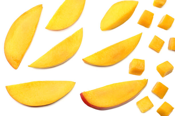 istock mango slice isolated on white background. healthy food. top view 1048686524