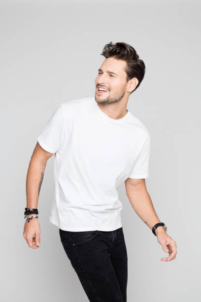 istock Fashion model in casuals smiling 1048695566