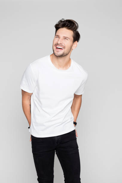 istock Cheerful young man looking away and laughing 1048698196