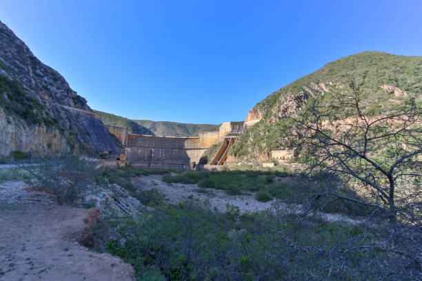 istock The full view of the dam wall without water 1048698628
