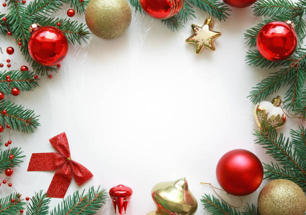 istock Christmas festive frame composition with copy space on white background, top view, flat lay. 1048699140
