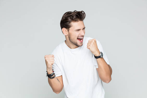 Excited man celebrating success