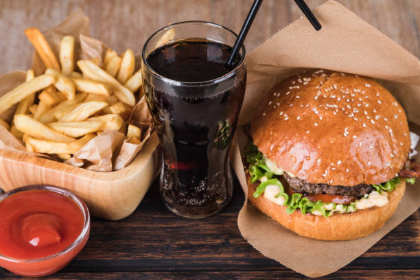istock Burger on a wooden board 1048707182
