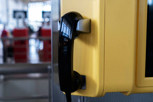 istock public telephone booth in airport terminal 1048707548