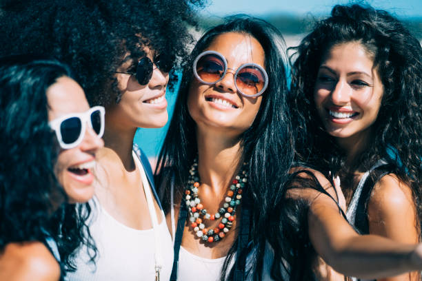 istock Beautiful women having fun 1048707838