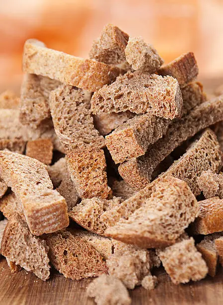 Black bread dried crust closeup