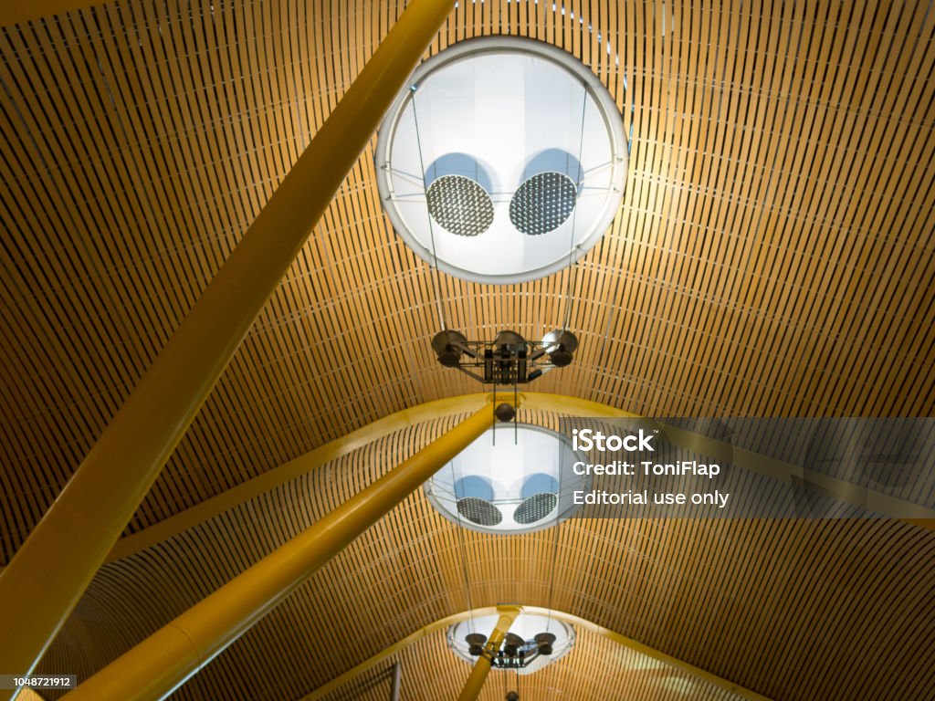 Interior of Barajas Airport in Madrid, Spain. Madrid, Spain - January 27, 2018: Interior of Barajas Airport in Madrid, Spain. Interior of Terminal 4, designed by Antonio Lamela and Richard Rogers Airport Stock Photo