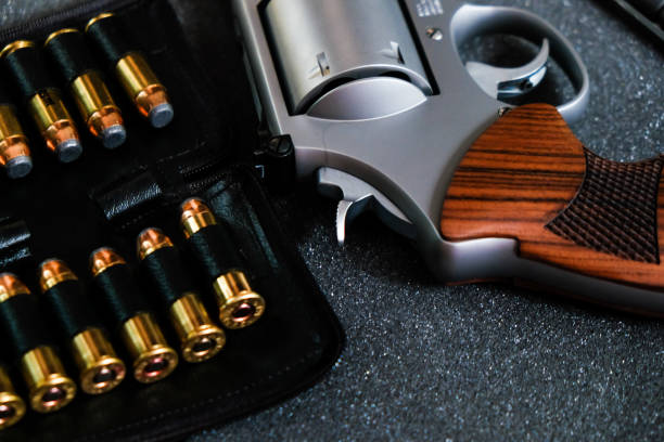 istock Revolver metal .44 .357 magnum gun with jacket soft point bullet 1048729986