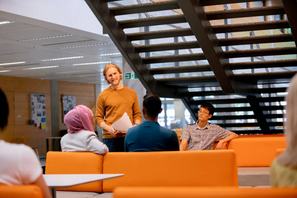istock Adult University Student Presenting Ideas 1048729996