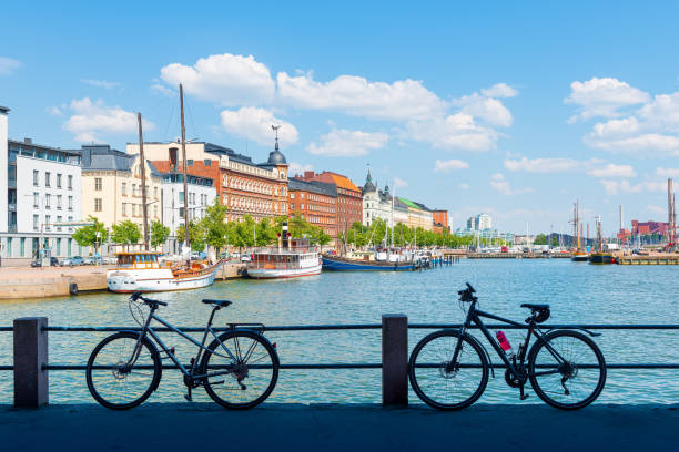 Summer panorama of the old port pier, Helsinki Scenic summer panorama with elegant art nouveau buildings and yacht marina of Helsinki old port photos stock pictures, royalty-free photos & images