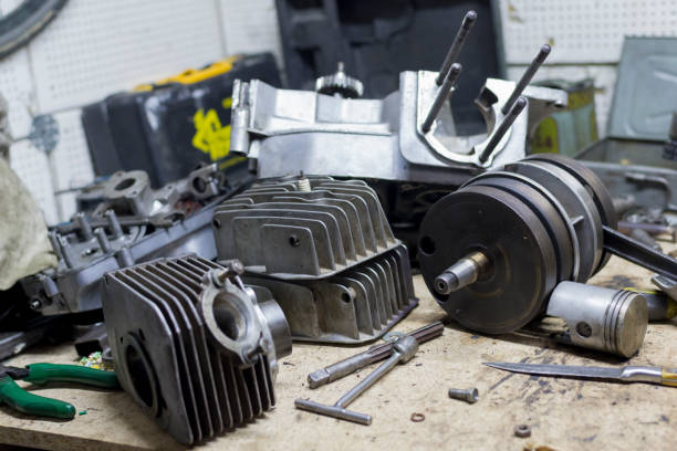 istock Motorcycle parts and tools on the desktop in garage 1048736420