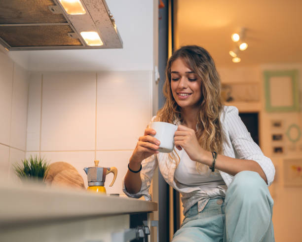 istock woman enjoying home activities 1048739662