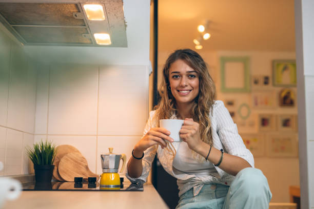 istock woman enjoying home activities 1048739930