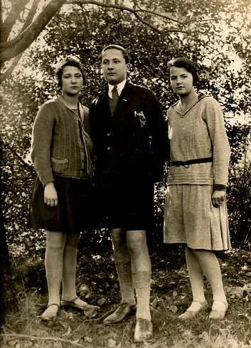1930s 1940s 1950s  italian family brother and sisters portrait taken in the forest