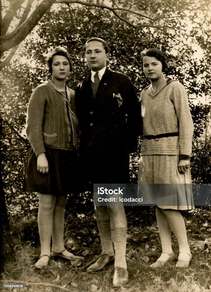 1920s italian family portrait 1930s 1940s 1950s  italian family brother and sisters portrait taken in the forest Family Stock Photo